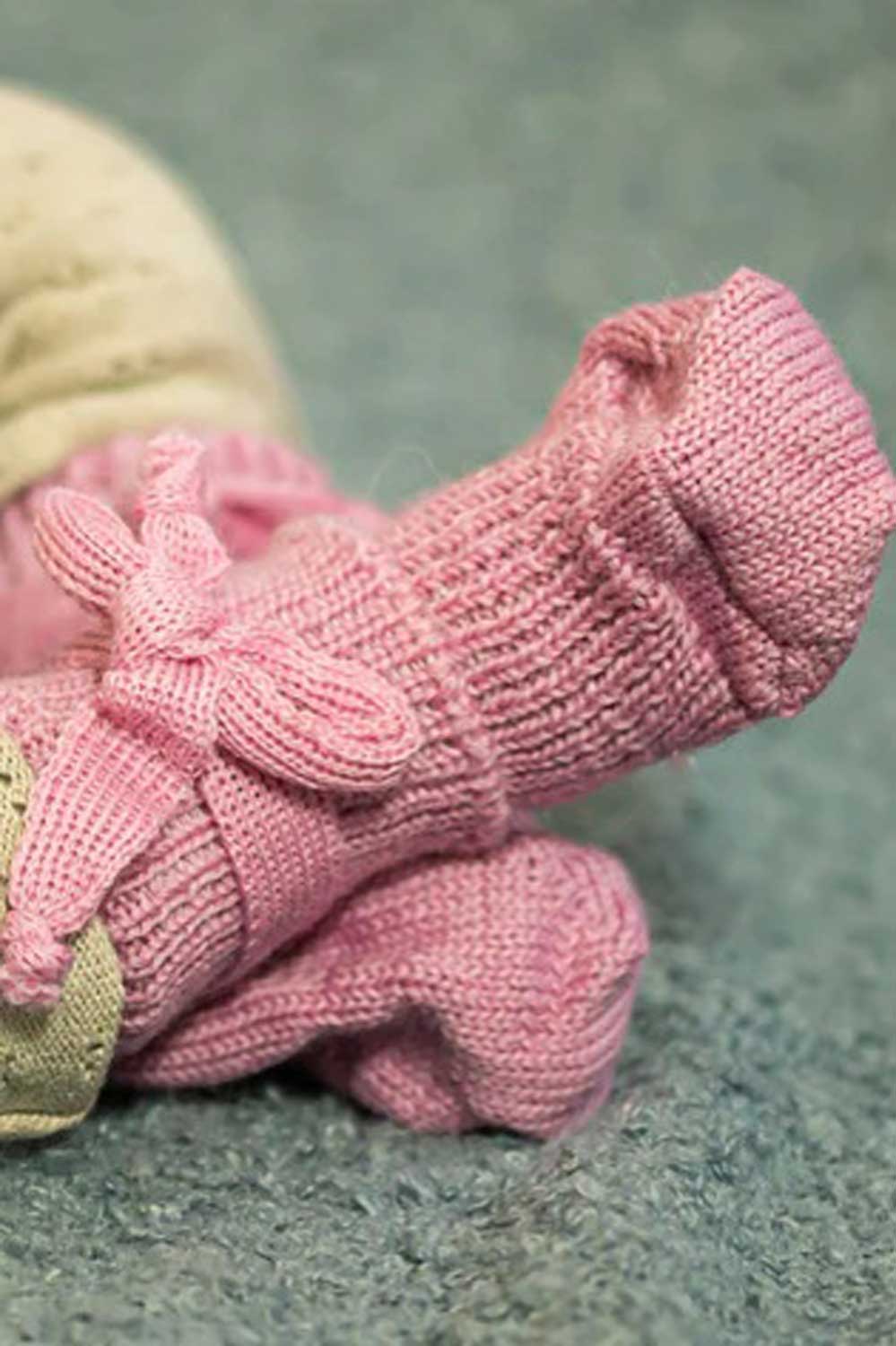 Wollen sokjes voor pasgeborene roze