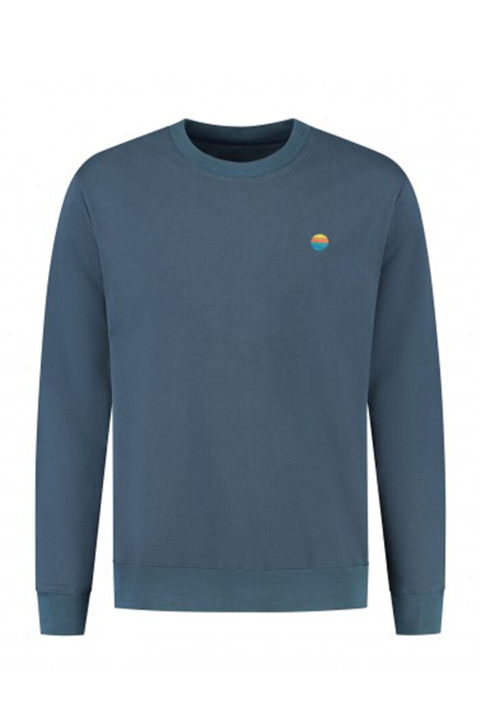 Blauwe sweater met zon